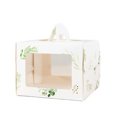 China Recyclable high quality thickened portable pattern pastry paper printing transparent cake box cake box with handle for sale