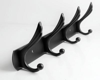 China Customized Minimalist Black Wall Mounted Stainless Steel Bedroom Hanging Clothes Coat Hooks for sale