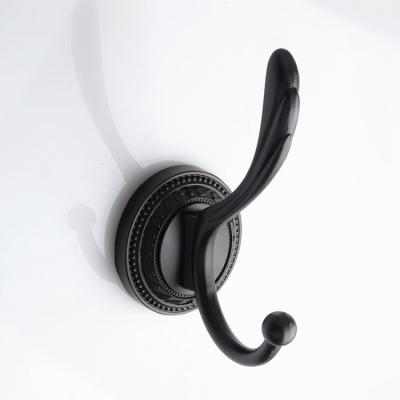 China Sustainable Wholesale Price Black Wall Mount Around Hook Base Designer Clothes Hanger for sale