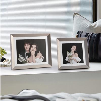 China Modern High Quality Epmc Carved Resin Crafts Photo Desk Wedding Frames for sale