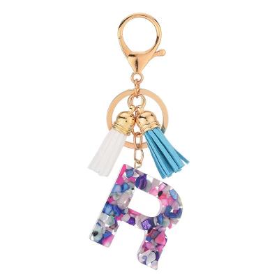 China Creative Fashion Handbag Charm With Simple Acrylic Letters Key Chains 26 Colors Tassel Key Chain for sale