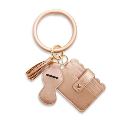 China Hot Leather Wristband Keychain Key Chain New Sale Key Chain Tassel Lipstick Bag PU Bag Card Bag Wristband Key Chain for sale