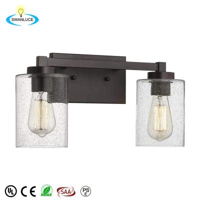 China Modern 2 Light Oil Rubbed Bronze Bathroom Vanity Lights Retro Wall Sconce With Clear Seeded Glass for sale