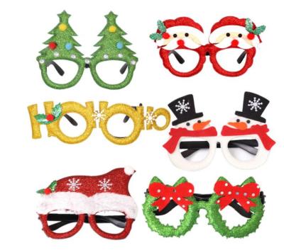 China Christmas Plastic Decorations Frame Adult Kids Toys Santa Snowman Antler Glass Christmas Decorated Glasses for sale