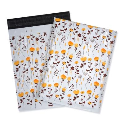 China Food Packaing Yellow Dandelion Flower Design In Stock Full Poly Support Customization Mailing Printing Bag for sale