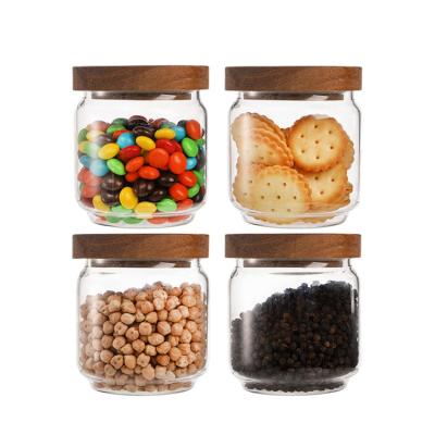 China 200ml Modern Glass Food Storage Jar With Lid And Handle Acacia Wooden Food Storage Glass Jar With Bamboo Lid for sale