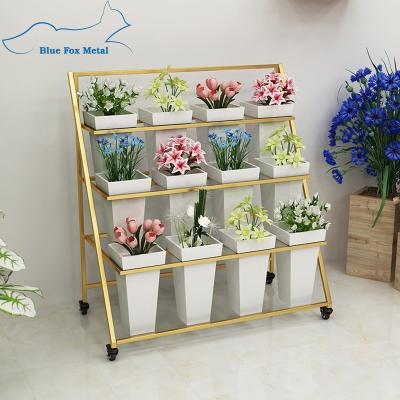 China Metal Folding Flower Rack Iron Art Flower Stand Movable Multi-Layer Flower Bucket Display Rack for sale