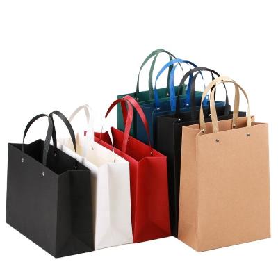 China Recycled Materials Customized Printing Tea Wine Clothes Clothing Shopping Tote Paper Bag With Logo Silver Gold Printed Kraft White Black Paper Bag for sale