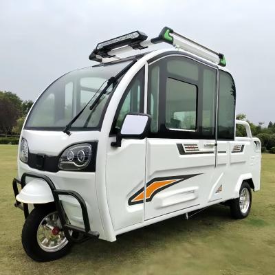 China Electric three-wheel pickup truck household cargo fully enclosed with shed to pick up children elderly adults double-row for sale