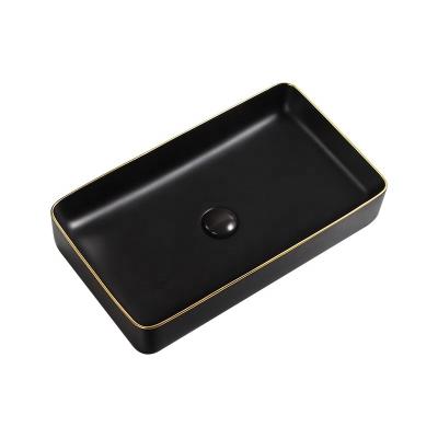 China Lavobo Modern Artistic Handmade Ceramic Countertop Basin Bowl China Wholesale Flower Shape Black Bathroom Sinks for sale