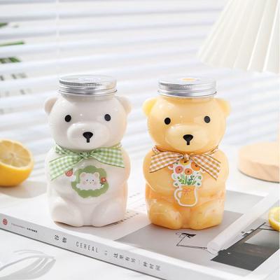 China 350ml 400ml 700ml Customize Pet Plastic Bear Shape Juice Bottle with Screw Cap and Straps for sale