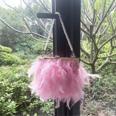 China Fashinable Newest Fashionable Women Shoulder Bag Pink Feather Pearl Designer Clutch Evening Bag for sale