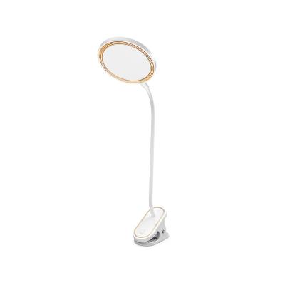 China Lighting Functions Xinnuoshi Adjustable Angle USB Table Lamp LED Reading Children's Table Lamp With Clip for sale