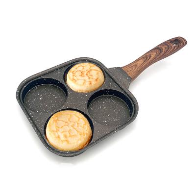 China Hotels 4 Hole Household Fried Eggs Nonstick Frying Pan Four-hole Stove Gas And Induction New for sale