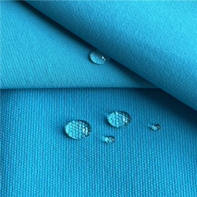 China 70D Stretch Pearl Point Four - Sided Stretch Nylon Spandex Fabric Enhancing Pants Outdoor Waterproof Fabric for sale