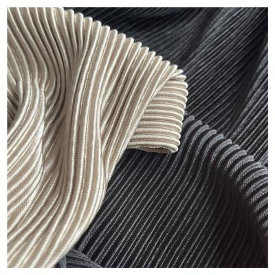 China Creased stretch knitted fabric 100% polyester feels soft and suitable for women's skirts and dresses for sale