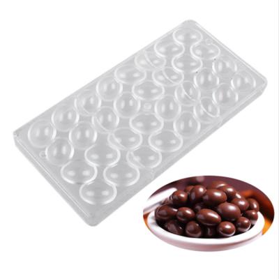 China Custom 32 Grids Polycarbonate Disposable Chocolate Mold Reusable Round Medal Polycarbonate Chocolate Mold for sale