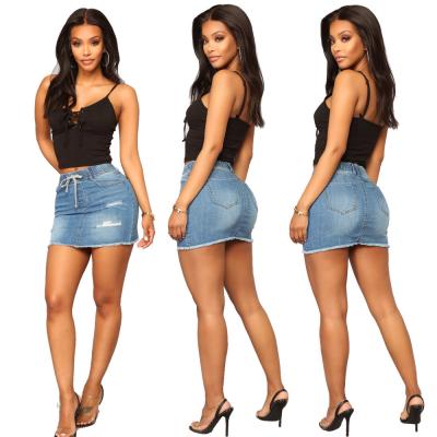 China Women's Casual Anti-Static Mid Waisted Washed Stretch Fringed Raw Edge Ripped Jeans Skirts for sale