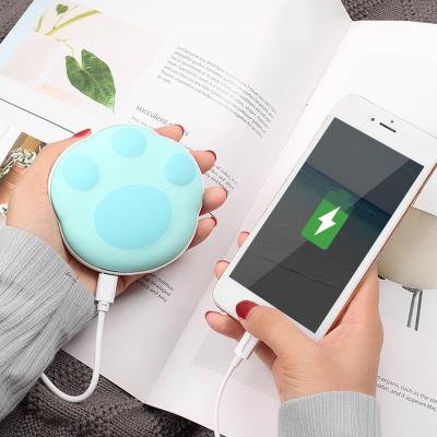 China Portable Cute Brown Blue Bear Paw USB Charging Rechargeable Hand Warmer 5000mAh Power Bank Gift For Women Girl for sale