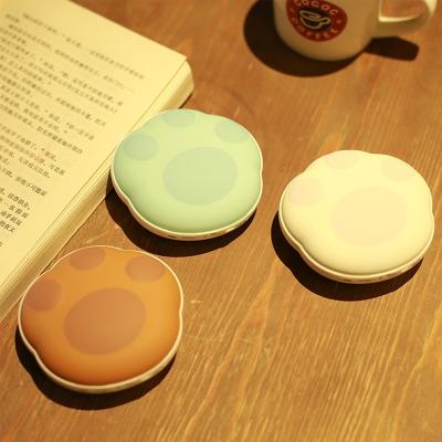 China Portable USB Bear Paw Cartoon Design Rechargeable Hand Warmer 5000mAh Power Bank 2 in 1 for sale