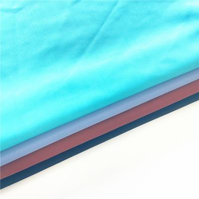 China Wholesale shiny bright 82%nylon 18%spandex swimwear swimming fabrics en venta