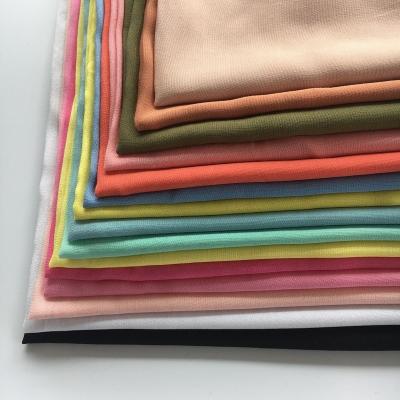 China Jersey air jet loom plain dyed rayon dubai solid color japan voile fabric for shirt en venta