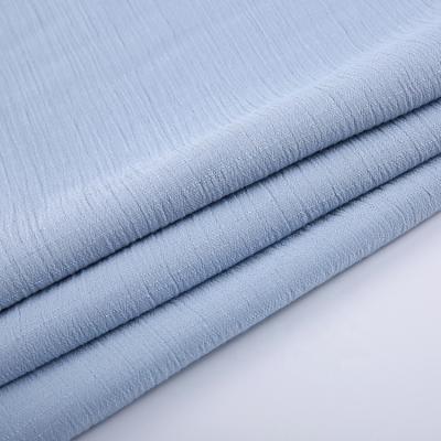 China HAHOO Custom blue slub imitation rayon nylon blend fabric dyed woven spandex fabric for garment en venta