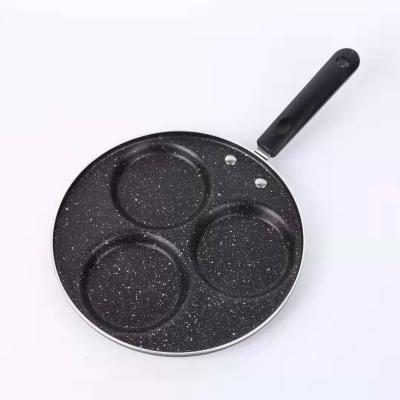 China New Style Minimalist Professional 3 Holes Aluminum Stick Pan Non Cooking Frying Pan For Eggs for sale