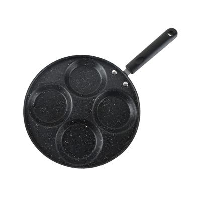 China New Minimalist Style Professional 4 Holes Non Iron Stick Pan Cooking Frying Pan For Eggs for sale