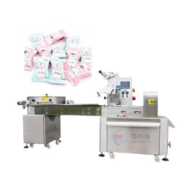 China Automatic Horizontal Small Food Candy Packing Machine Multi-Function Packaging Machine for sale