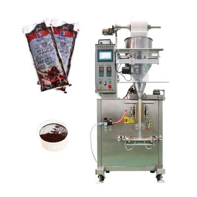 China Small Vertical Automatic Food Packing Machine / Power Packing Machine Tomato Sauce Chocolate Cream / Seed Packing Machine for sale