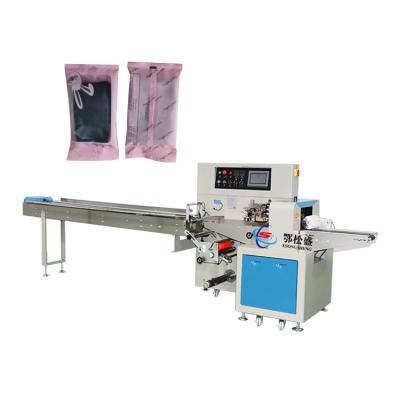 China Horizontal Automatic Food Socks Gloves Shoes Shaver Wrapping Wrapping Machine for sale