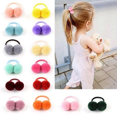 China Baby Ball Hair Decorations Double Fluff Elastic Hair Rope Cute Hair Ties For Girls Solid Color Pompom Hair Ring for sale