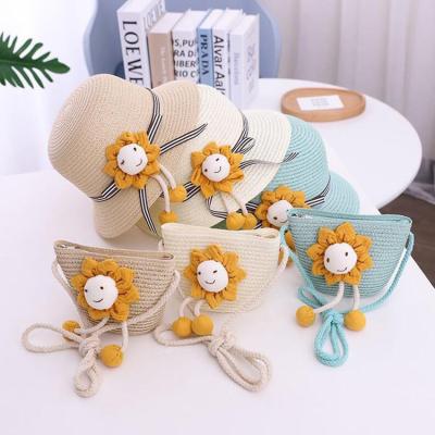 China Kids Fisherman Sun Visor Hat Summer Beach Smile Doll Eco-Friendly Hat For Kids Soft Straw Hat Bag Set Gift for sale