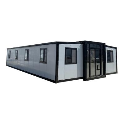 China Goed waterdicht branddicht winddicht staal luxe uitbreidbaar containerhuis met gegalvaniseerd plaatglas wol wandpaneel Te koop