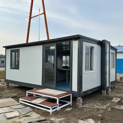 China Estilo de diseño contemporáneo listo para el envío 20 pies fácil de instalar tipo de villa expandible para casas prefabricadas de acero ligero impermeable en venta