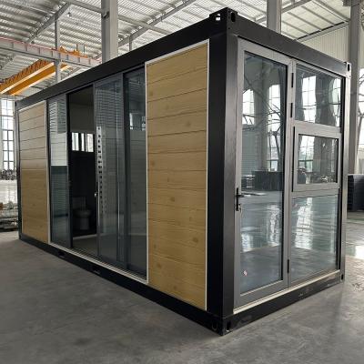 China Black Modern Design Style Flat Pack Container Home Insulated Prefab Container Houses For Quick Setup And Installation for sale