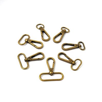 China And Durable Sturdy Metal Wholesale Antique Copper Burned Dog Hook Purse Hardware Zinc Alloy Oval Swivel Snap Hook for sale