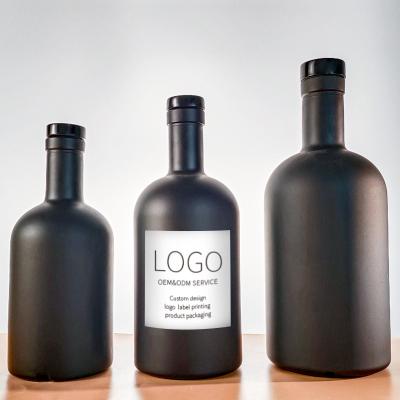 China Free Sample Matte Black Empty Juniper Glass Beverage Bottle 100ml 200ml 375ml 500ml 750ml 1000ml Olive Oil Glass Bottle With Wooden Cork for sale