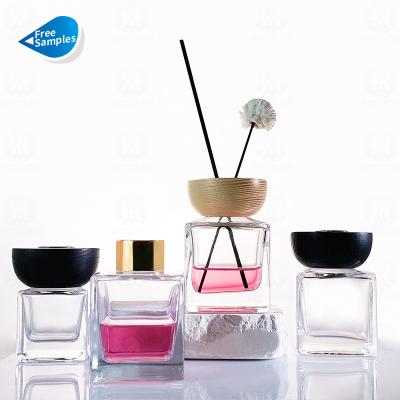 China Wholesale Cosmetic Reed Diffuser Square Decorative Clear Perfume Premium Glass Bottle 50ml 100ml 150ml 200ml With Wood Or Metal Cap for sale