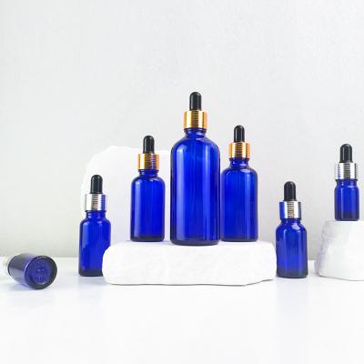 China Free sample 5ml 10ml 15ml 20ml 30ml 50ml 100ml essential oil glass cosmetic bottle with dropper and rubber glass tube for sale