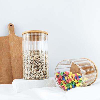 China Multifunctional Used Airtight Glass Food Storage 450ml 750ml 1000ml Cheap Price Kitchen Food Jar With Wooden Lid And Pull Ring for sale