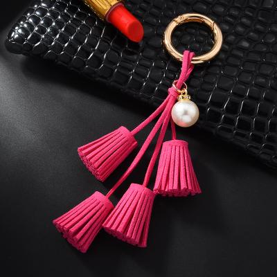 China Charm Eco-friendly Korean Leather Pendant Ladies Pearl Tassel Key Chain Suede Tassel Key Chain Bag Pendant for sale