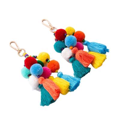 China 2021 Simplicity Tassel Hair Ball Bag Boho Color Pendant Tassel Bead Pendant Key Chain For Women for sale