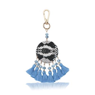 China Simplicity Fashion DIY Handmade Cotton Tassel Beaded Key Chain Crystal Pendant Keychain Tassel Bag for sale