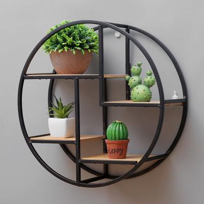 China Fashionable Round Wall Shelf Mounted Iron Storage Hanging Floating Shelves Show Rack Vases Shelf Wooden Style Iron Industrial Craft for sale