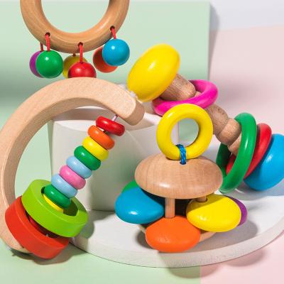 China Musical Instrument Wooden Infant Handheld Rattle Orff Four-Piece Rattle Set Early Education Toys For Babies for sale