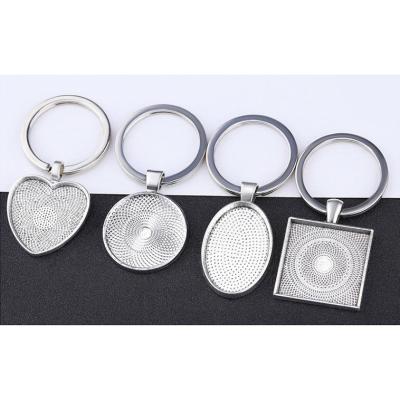 China TRENDY Silver Plated Frame Tray For Keychain Diy Metal Base Tray Square Heart Round High Quality Photo Key Chain Base for sale