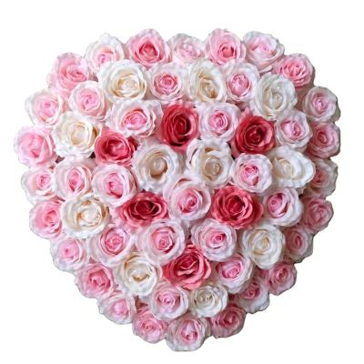 China Flower wall for wedding new design 2021 artificial silk heart shape wedding wall artificial floral wall decorative flower wall rose panel for sale