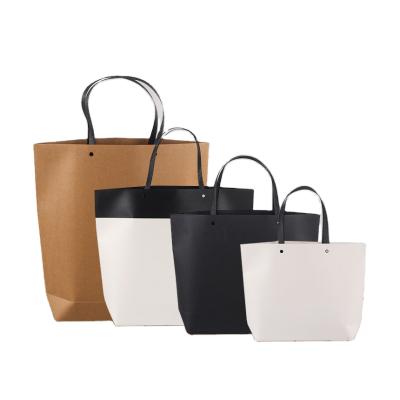 China Disposable Customized Boat Shaped Kraft Paper Clothing Bag Paper Bag Gift Bag for sale